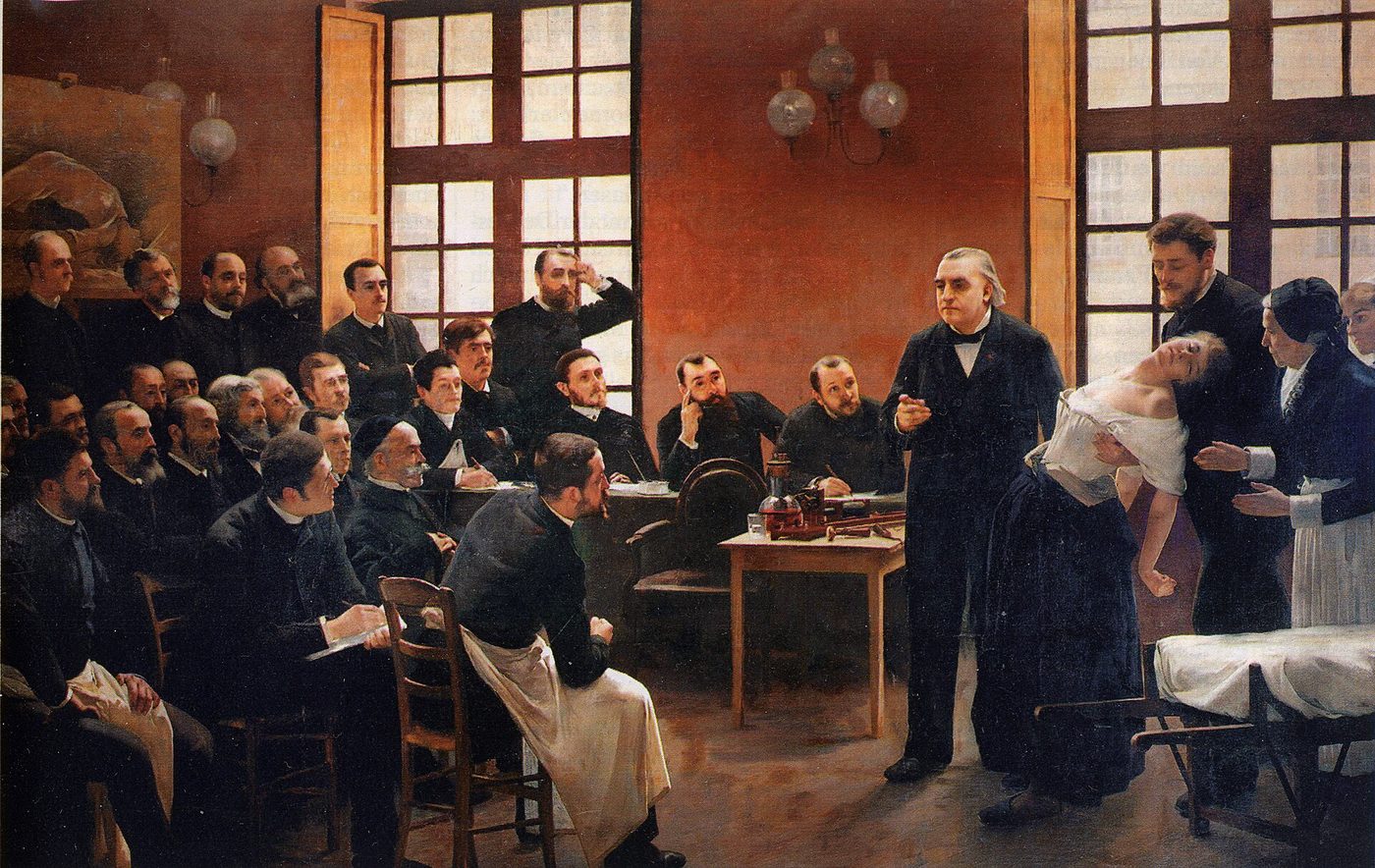 Óleo de 1887: Charcot expone ante un auditorio de hombres mientras una paciente se desmaya en brazos de un ayudante