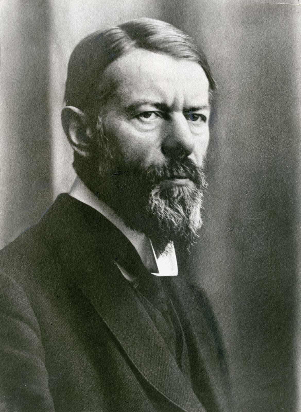 Retrato fotográfico de Max Weber en 1918, con barba, mirando a la cámara